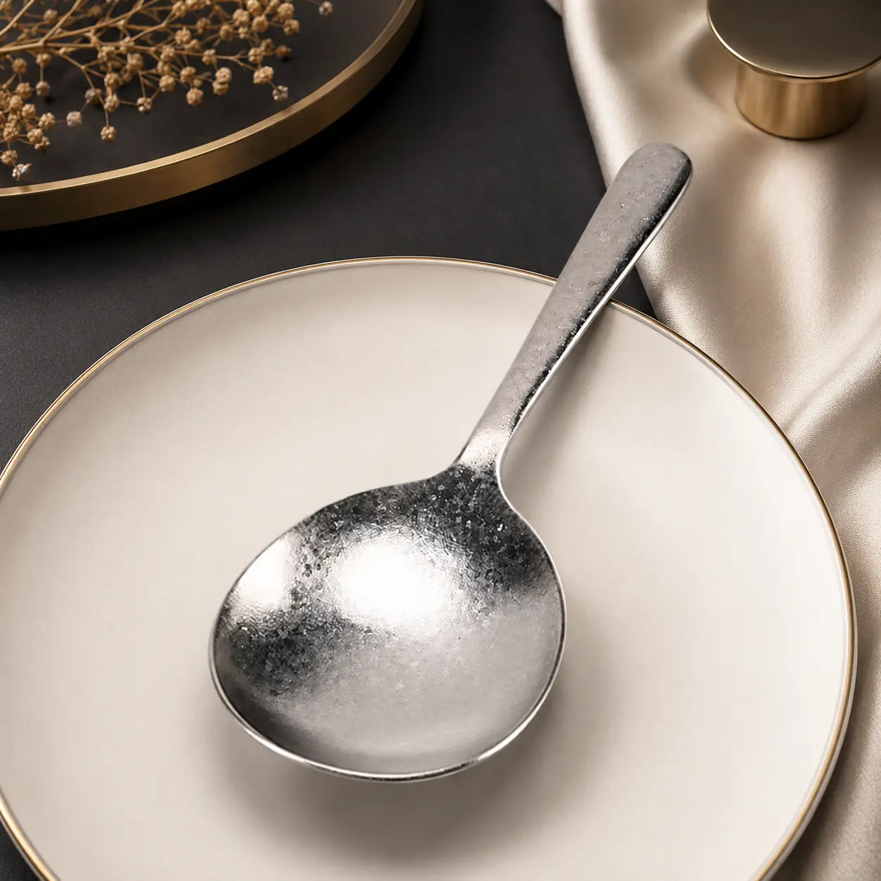 Titanium serving spoon