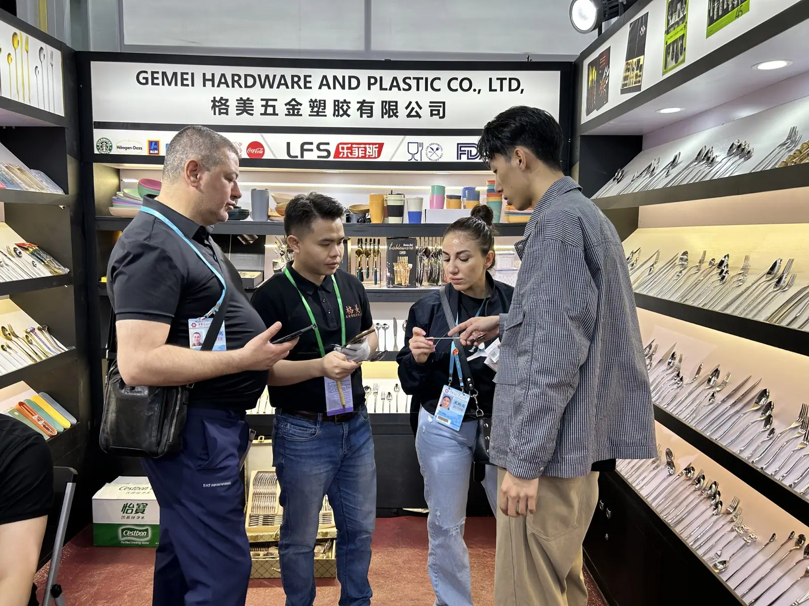 GEMEI team discussing products with a buyer